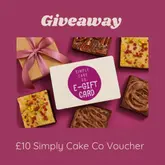 A clean, professional promotional graphic for a giveaway featuring a Simply Cake Co. e-gift card centered among several brownies on a solid purple background.