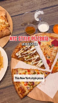 Delicious Capo calzone and Maradonner roll at Pitfire Slice Bar, Leicester, featuring garlic butter, chicken, and lamb donner.