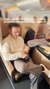 Traveler contemplating life advice with a suitcase, ready for an adventure.