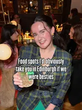 Best friends exploring Edinburgh's vibrant streets, sharing memorable moments and local sights.