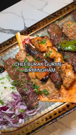 Influencers enjoying a private evening at CZN Burak, showcasing a vibrant Turkish menu in Birmingham.