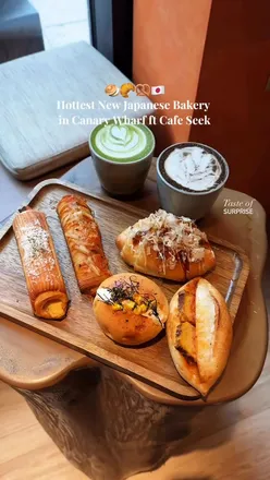 Cafe Seek in London, bustling with patrons enjoying fresh pastries and cakes crafted by founders Pinky & Emily.