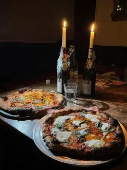 Delicious pizzas at Dough Hands Pizza in The Spurstowe Arms, Dalston: The OG and Jode with unique toppings and hot honey.