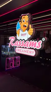 Delicious desserts at Rassam's: chocolate fondue, Nutella waffle, and San Sebastian cheesecake, plus refreshing mocktails.