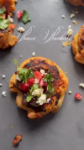 A recipe tutorial video demonstrating how to make paneer pinwheels using puff pastry and canned tomatoes.