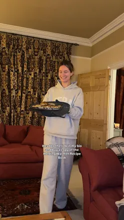 A family enjoys a homemade chicken kebab dinner using a recipe from the ‘Holding Warmth’ charity cookbooks.