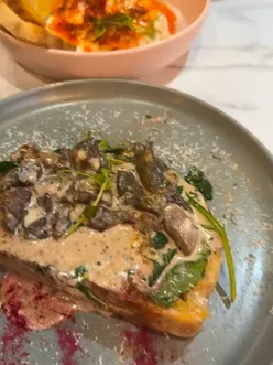 Brunch lovers enjoying delicious dishes at The Bloom Cafes in Moseley, Birmingham with a cozy ambiance and excellent service.