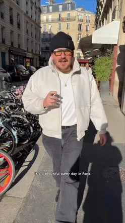 Couple enjoying a scenic moment in Paris with Jameson Whiskey during a brief getaway.