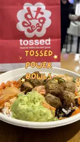 A short vlog-style video documenting a lunch visit to a Tossed location, featuring the ordering process at a kiosk and a review of a Korean kimchi power bowl.