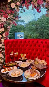 A promotional reel showcasing a luxurious Mediterranean restaurant and lounge, featuring close-ups of various dishes, cocktails, and the venue's opulent interior decor.