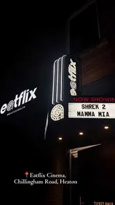 A review of Eatflix Cinema, showcasing the immersive experience of watching a film while enjoying a themed set menu of food and drinks.