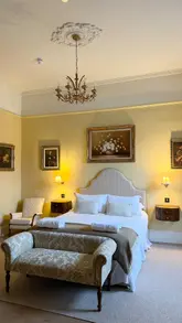 A tour of The Townhouse in Leith, Edinburgh, showcasing the MacSwan suite, including the kitchenette, bathroom, and bedroom area.