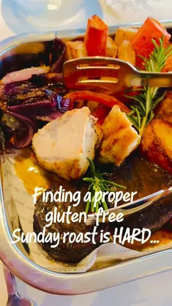Gluten-free Sunday roast at Lakeview Lounge & Bar, Copthorne Hotel Cardiff, featuring chicken, beef, and delicious desserts.