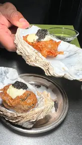 A couple visits Noisy Oyster in Shoreditch for a date night, showcasing a variety of dishes including oysters, crudo, octopus, pasta, and dessert, along with cocktails.