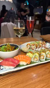 A promotional reel for a Japanese bottomless brunch venue, featuring a montage of various sushi, sashimi, and small plates alongside drinks. The video uses rhythmic editing to showcase the food and the lively atmosphere, including a resident DJ.