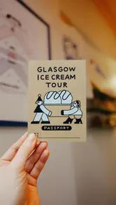 A creator documents their experience completing a 'Glasgow Ice Cream Tour' passport, visiting several local ice cream parlours in Glasgow, showcasing the passport, the stamps, and the ice cream flavours at each stop.