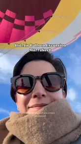 A personal vlog documenting a hot air balloon excursion in Marrakech, Morocco. The video covers the early morning start, the preparation of the balloons, the ascent through the clouds, and the scenic views, providing a recommendation for the activity.