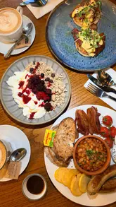 A short, montage-style video showcasing brunch dishes at Zest in York, including eggs benedict, a full English breakfast, and berry granola, interspersed with a brief shot of the venue's interior.