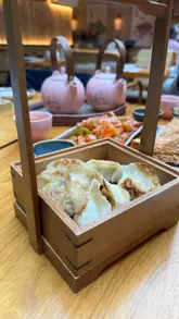 A well-produced promotional video for Mulan Noodle, showcasing the restaurant's interior, the chef's preparation, and a variety of Chinese dishes.