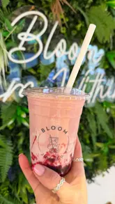 A short, aesthetic video showcasing the functional smoothie menu at Bloom Juice Co. The video features a quick montage of the menu board, the blending process, and the final product presentation.