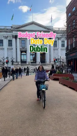 Couple enjoying a budget-friendly day in Dublin using RedClick dublinbikes for eco-friendly transportation.