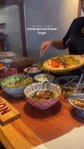 A short, energetic video showcasing the preparation of a falafel pitta at a Palestinian street food venue. The video features close-up shots of fresh ingredients, the assembly process, and the final product, highlighting the customisable nature of the meal.