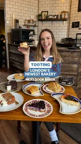 A review of a new bakery in Tooting called Next Door Baker, highlighting its vegan offerings and cozy atmosphere.