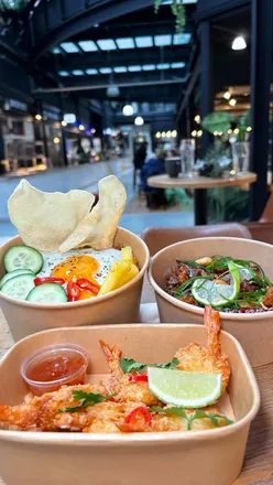 Vibrant dishes at Ceylon M8 in Newport Market, featuring butterfly prawns, nasi goreng, and hot butter squid.