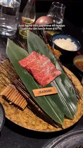 A short, punchy review of a Japanese A5 Wagyu yakiniku lunch set in London. The video features close-up shots of the raw meat, the grilling process, and the accompanying side dishes like wagyu curry and salad, effectively highlighting the quality and value of the meal.