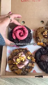A short, energetic video showcasing a visit to After School Cookie Club, highlighting their plant-based, large, filled cookies and matcha latte.