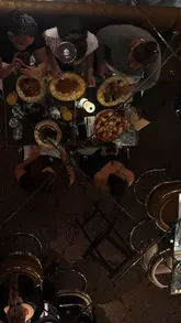 A montage-style video showcasing the interior, food, and drinks at Barbarella restaurant in Canary Wharf. The video features shots of the glamorous decor, cocktails being poured, and various Italian dishes being served, set to music.