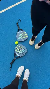 A creator visits a Padel court venue, showing the facilities, the courts, and the cafe area. The video includes shots of the creator playing, the menu board, and the overall atmosphere of the venue.