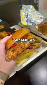 A short, casual video showcasing the 'Salt & Pepper' limited edition menu at Shakedown, featuring a chicken burger, spice bag, and chicken wings. The video includes close-up shots of the food, the menu, and the venue's interior, with a focus on the curry sauce pairing.