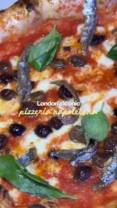 A fast-paced, music-driven montage showcasing various Neapolitan-style pizzas, a fried appetizer, and a lemon dessert at Vasiniko in London. The video uses quick cuts and close-up shots to highlight the texture and quality of the food.