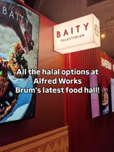 An informational image taken at a food hall, featuring signage for various vendors and a text overlay highlighting halal options.