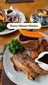 A high-quality review of a Sunday Roast experience at a luxury hotel restaurant in the Scottish Highlands. The video features close-up shots of various courses, including starters, the main roast, and desserts, alongside glimpses of the venue's interior and the dining experience.