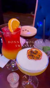 A short, fast-paced video showcasing a bottomless brunch experience at Bonnie Rogues in Swansea, featuring shots of cocktails, prosecco, burgers, and scampi, set to upbeat music.