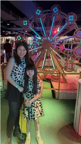 A mother and daughter visit Swingers for a day out, showcasing the crazy golf course, arcade games, and food options like pizza and cocktails.