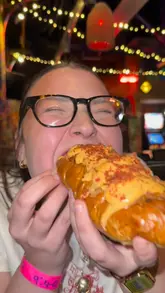 A group of friends visits Ghetto Golf for a bottomless brunch, featuring cocktails, loaded hot dogs, nachos, mini golf, and virtual darts.