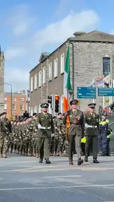 A high-energy, fast-paced montage capturing the atmosphere of St. Patrick's week in Dublin, featuring parade footage, live music performances, and a visit to the Guinness Storehouse.