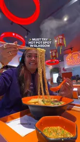 A creator visits Zhangliang Malatang in Glasgow, demonstrating the self-service hot pot process from ingredient selection to the final meal.