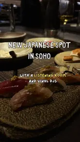 A short, visually appealing reel showcasing a Japanese restaurant in Soho called MOI. The video highlights the intimate, minimalist interior, the listening room with DJs, and a variety of dishes including buns, sashimi, nigiri, octopus, and apple pie.
