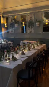 The video features a creator visiting Browns Brasserie to experience their new seasonal menu. It includes shots of the restaurant interior, table settings, various dishes like steak tartare and sea bass, and new spring-themed cocktails.
