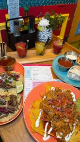 A montage-style review of Poko Loko in Glasgow, showcasing their Mexican menu including tacos, nachos, burritos, churros, and a margarita flight. The video uses text overlays to provide information about the venue and the food.