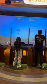 A POV-style video showcasing the experience at Clays Bar in Soho, featuring the digital clay pigeon shooting game and the bar area.