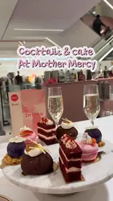 A mother-daughter outing featuring an afternoon tea experience at Mother Mercy, located within a department store. The video highlights the bottomless cocktail offering served in teapots and a selection of cakes, including red velvet, choux buns, and blueberry cheesecake.