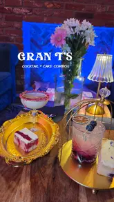 A promotional reel for Gran T's Coffee House in Ancoats, highlighting their new evening menu featuring cocktail and cake pairings. The video features shots of the cozy interior, the menu, and close-ups of the specific pairings served on gold trays.