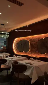 A promotional reel for a new Turkish Mediterranean restaurant in Mayfair, featuring shots of the interior design, open kitchen, various meze and grill dishes, and cocktails.