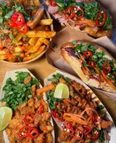 Vietnamese feast from The Hanoi Social Bristol: banh mi, sriracha fries, chilli chicken, and salt & pepper squid.