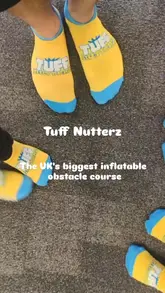 A short video showcasing the Tuff Nutterz inflatable obstacle course, featuring a child navigating various inflatable obstacles and slides.